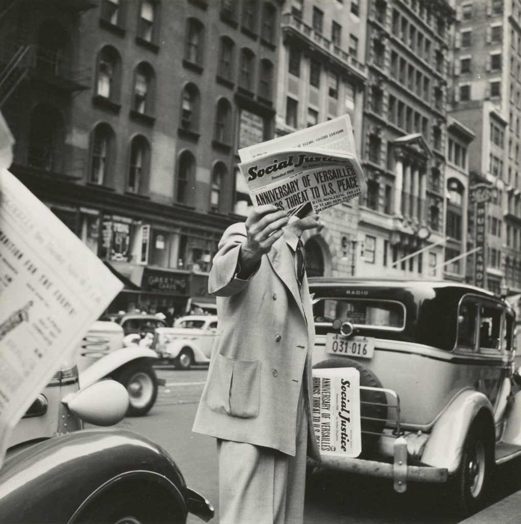 grayscale photography unknown person holding newspaper, Photo by The New York Public Library